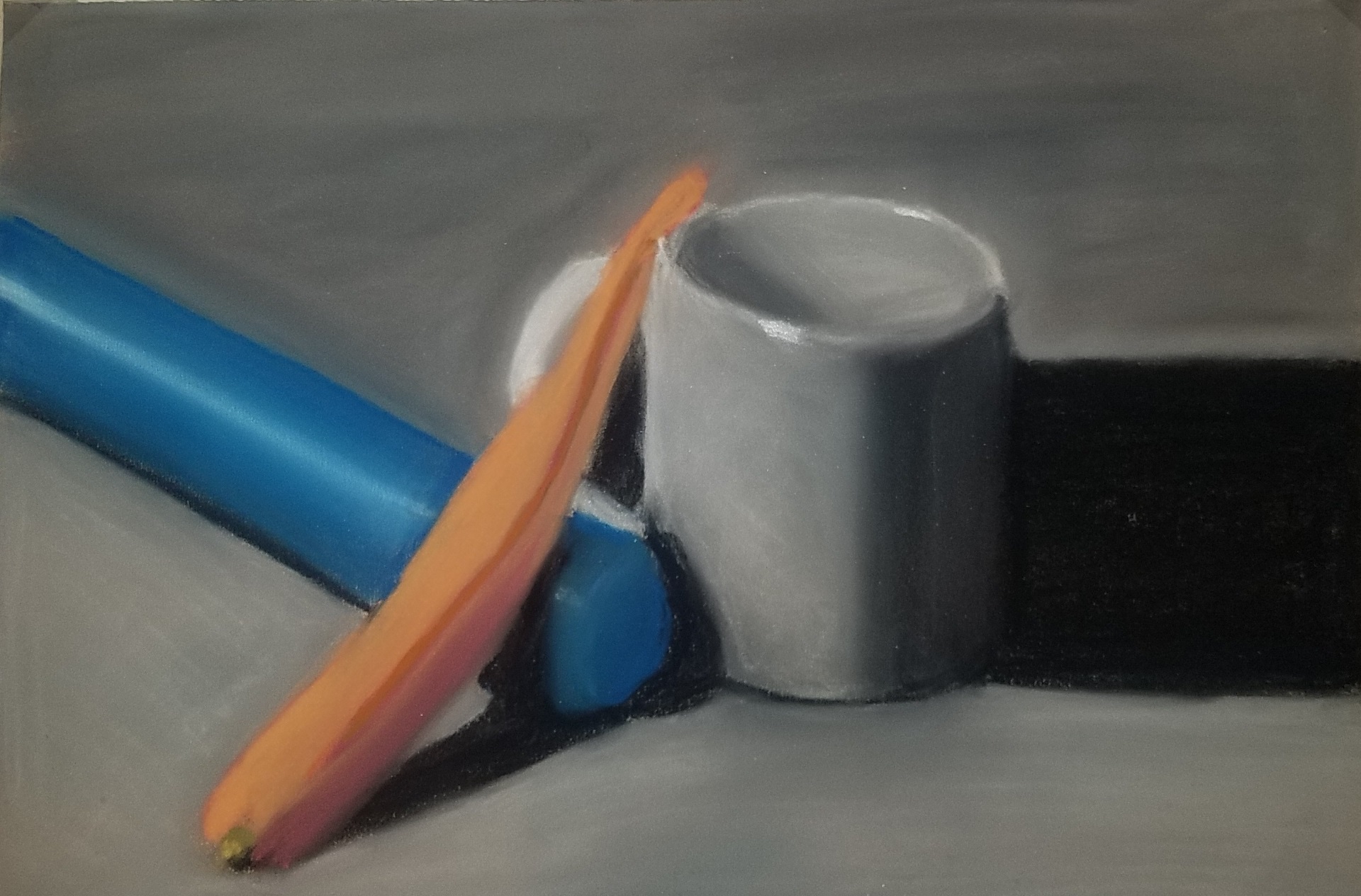pastel blue flashlight next to carrot next to white coffee mug