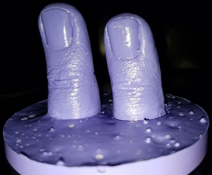 plastic mold of two fingers