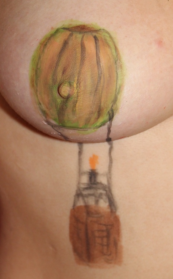 painting on right breast of hot air balloon
