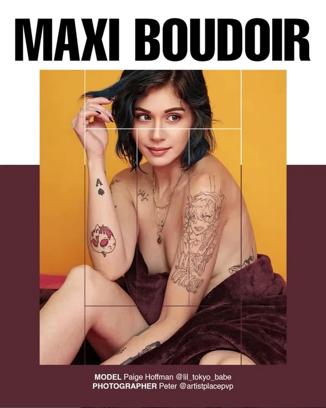 Female model sitting on bed wrapped in blanket