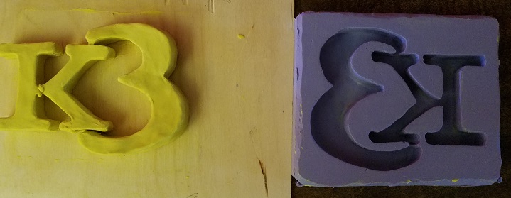 rubber mold cast next to original clay model