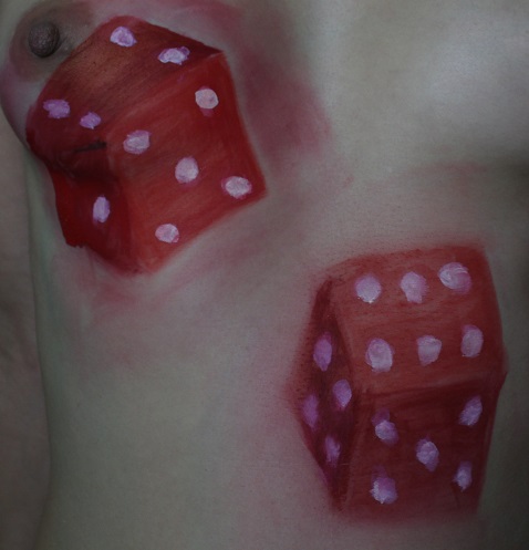 body painting pair of red dice on female torso