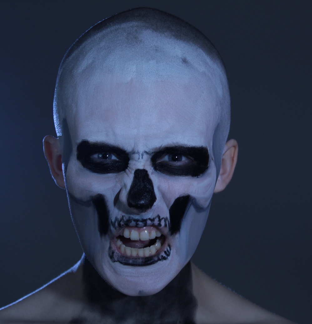 female model head body painted as skull