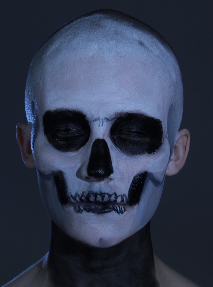 female model head body painted as skull