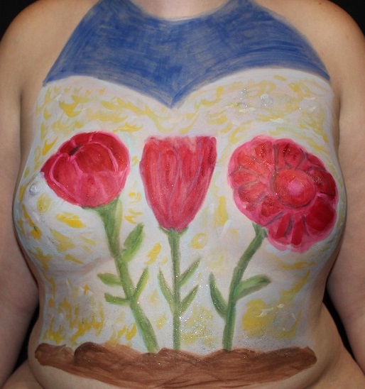 3 roses painted across female torso