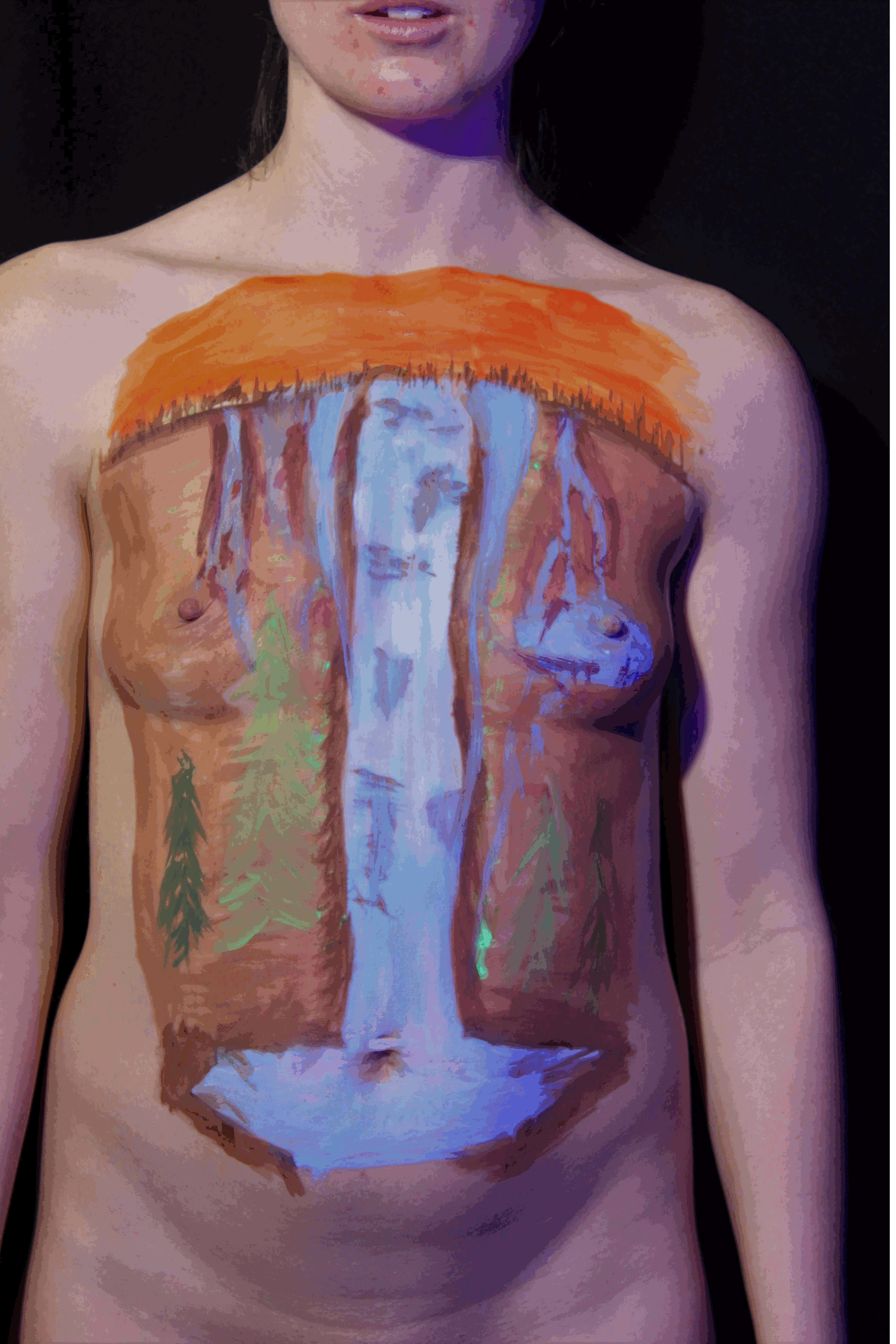 Waterfall in U V body paint on female torso switching between day light and U V light