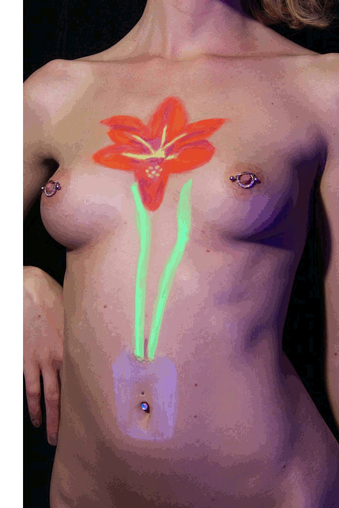 body painting of Red Lion flower done in U V body paint on female torso GIF image switching between daylight and U V light