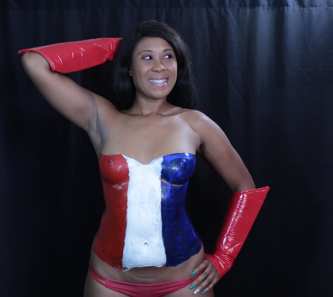 Body painting in latex: of red, white, blue vertical stripes on female torso
