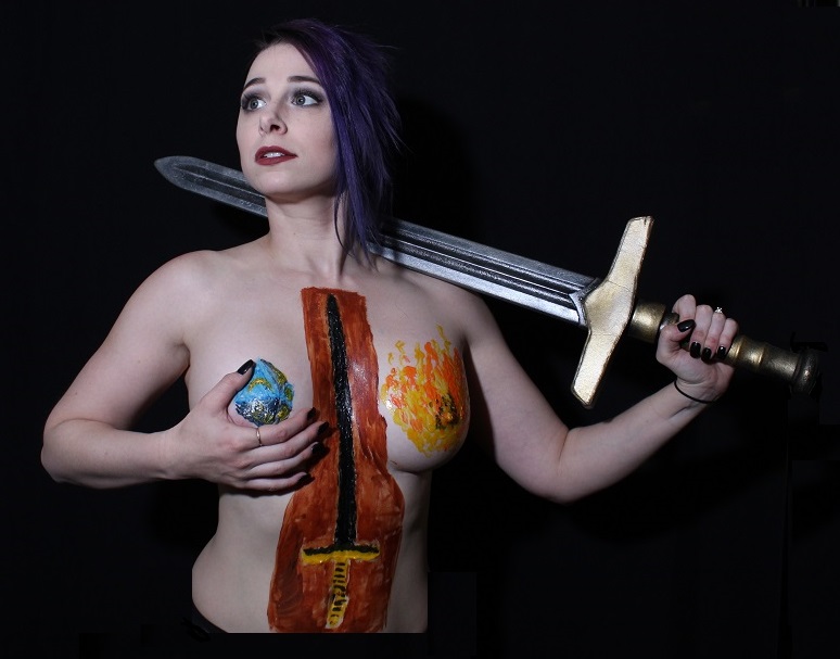 Body painting in latex: right breast D & D Die, left breast, ball of fire, Center, between breasts a sword